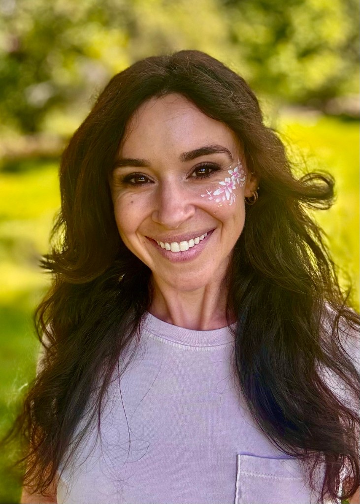 Gracie, the artist behind Wildflower Face Art
